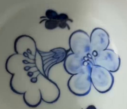 Flower decoration, cropped interior detail of the same cup